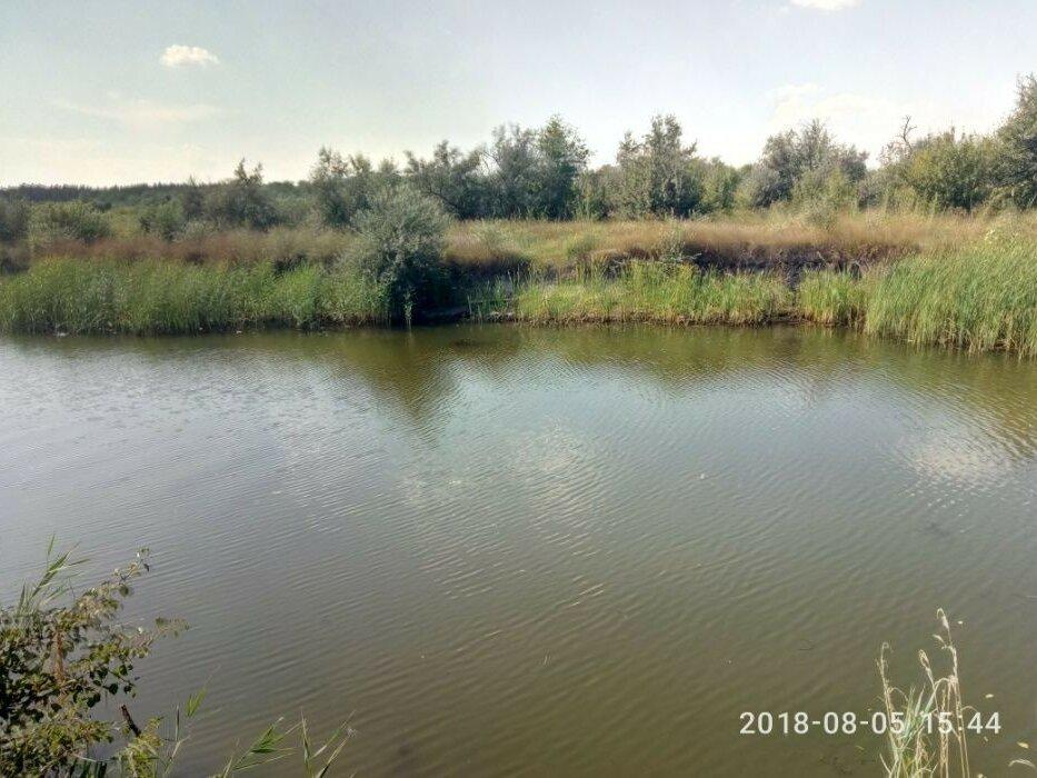 Продам земельный участок на берегу реки на полуострове в Подгороднем