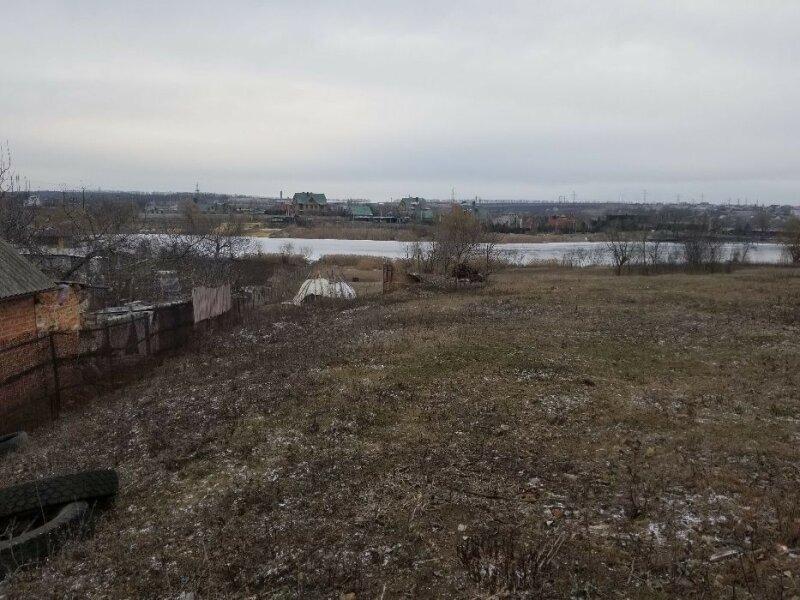 Земельный участок в с.Ольховка 6 км от окружной. Свой выход к воде .