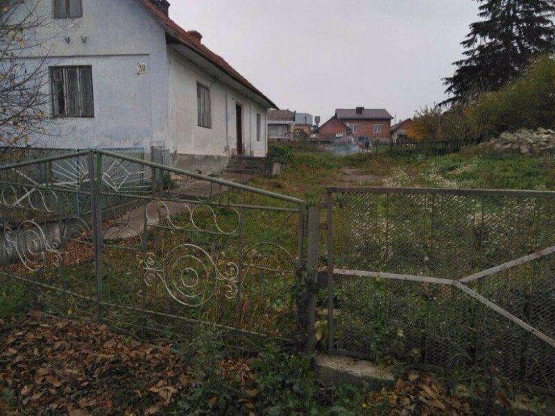 Продам ділянку з будинком під забудову в Козові