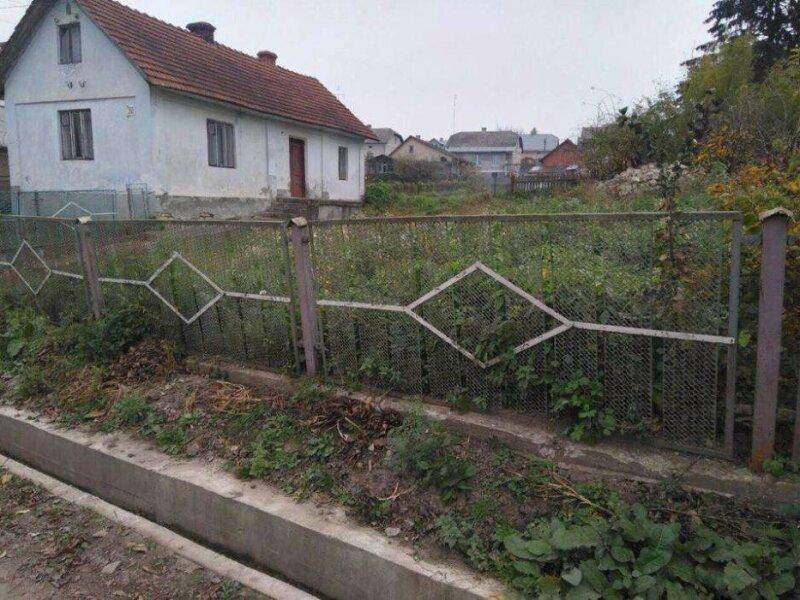 Продам ділянку з будинком під забудову в Козові