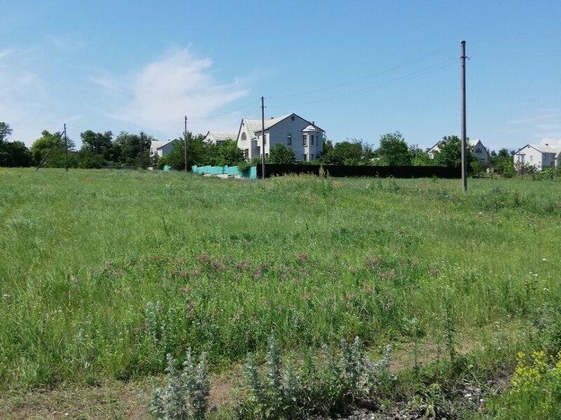 Продам земельный участок в Малой Рогани в самом поселке возле садика